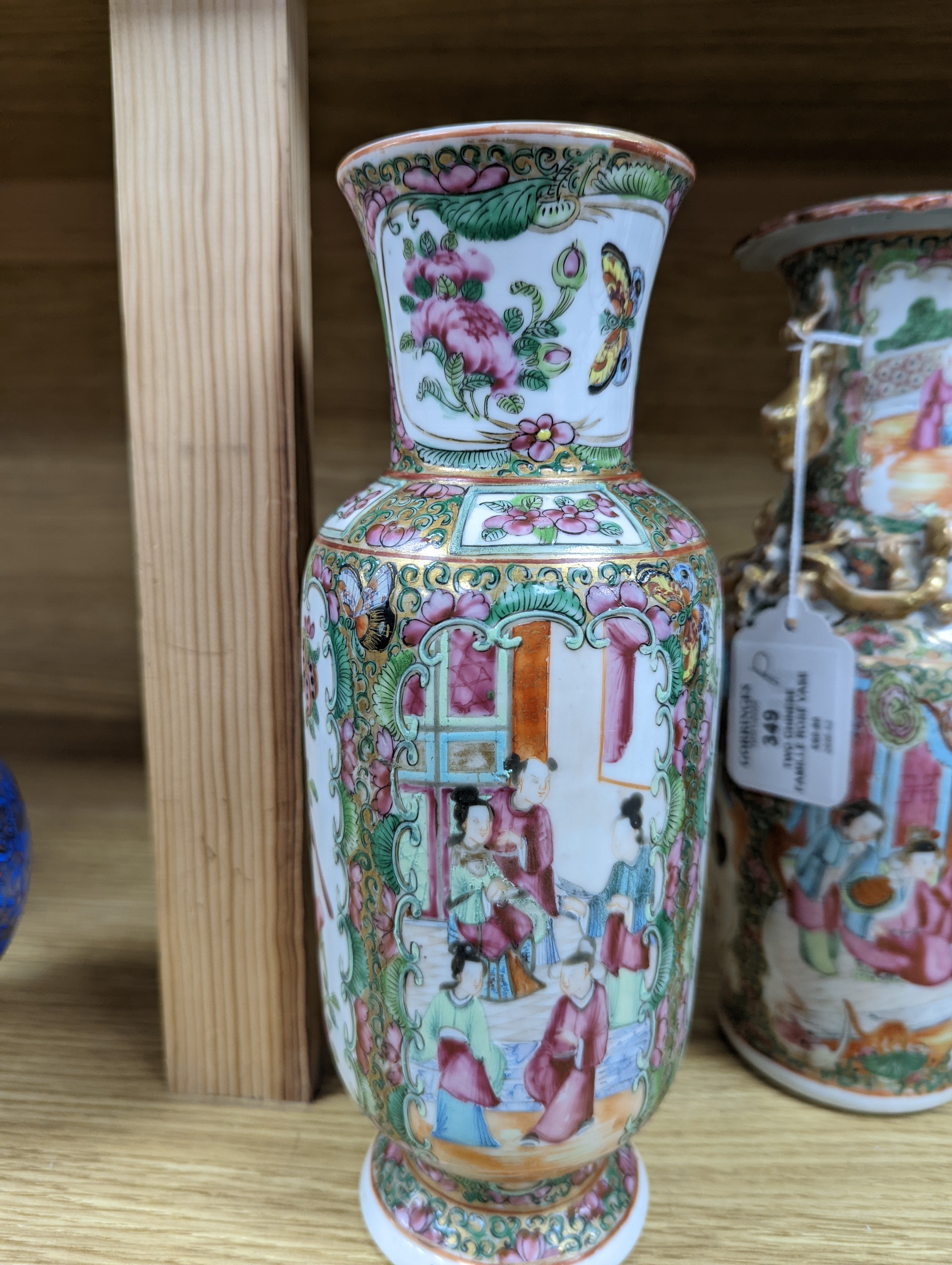 Two Chinese famille rose vases, late 19th century, tallest 26 cm, one wood stand, some restoration
